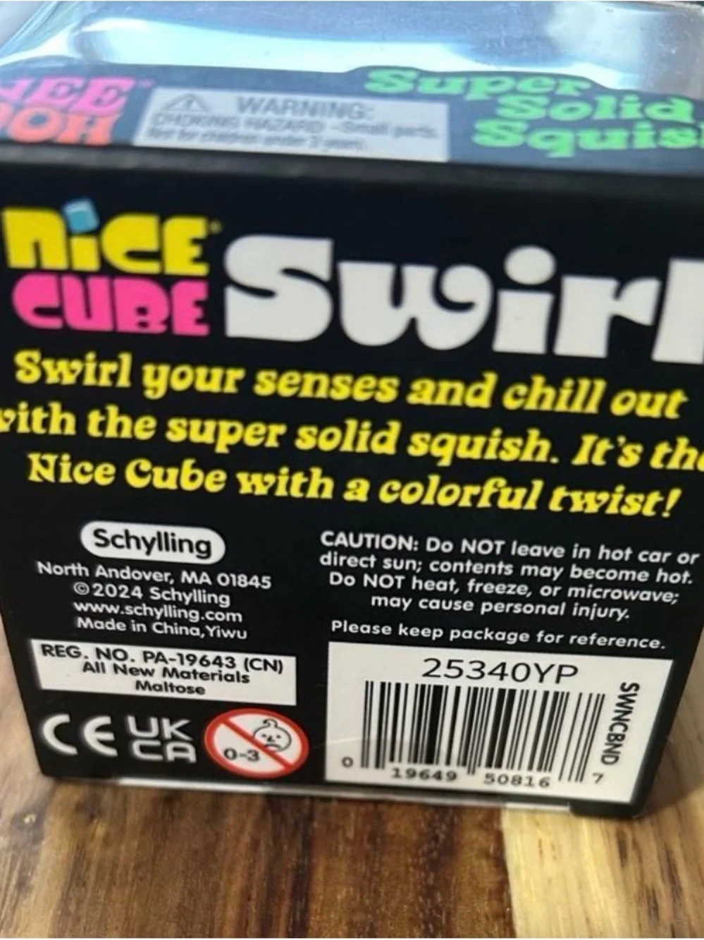Nee Doh Nice Cube Swirl Purple & Gray Super Solid Squish Medium in size